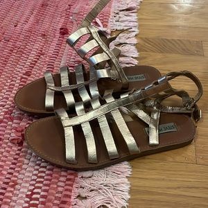 Gold leather gladiator sandals